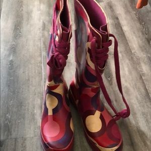 Coach rain boots listed as periwinkle color.